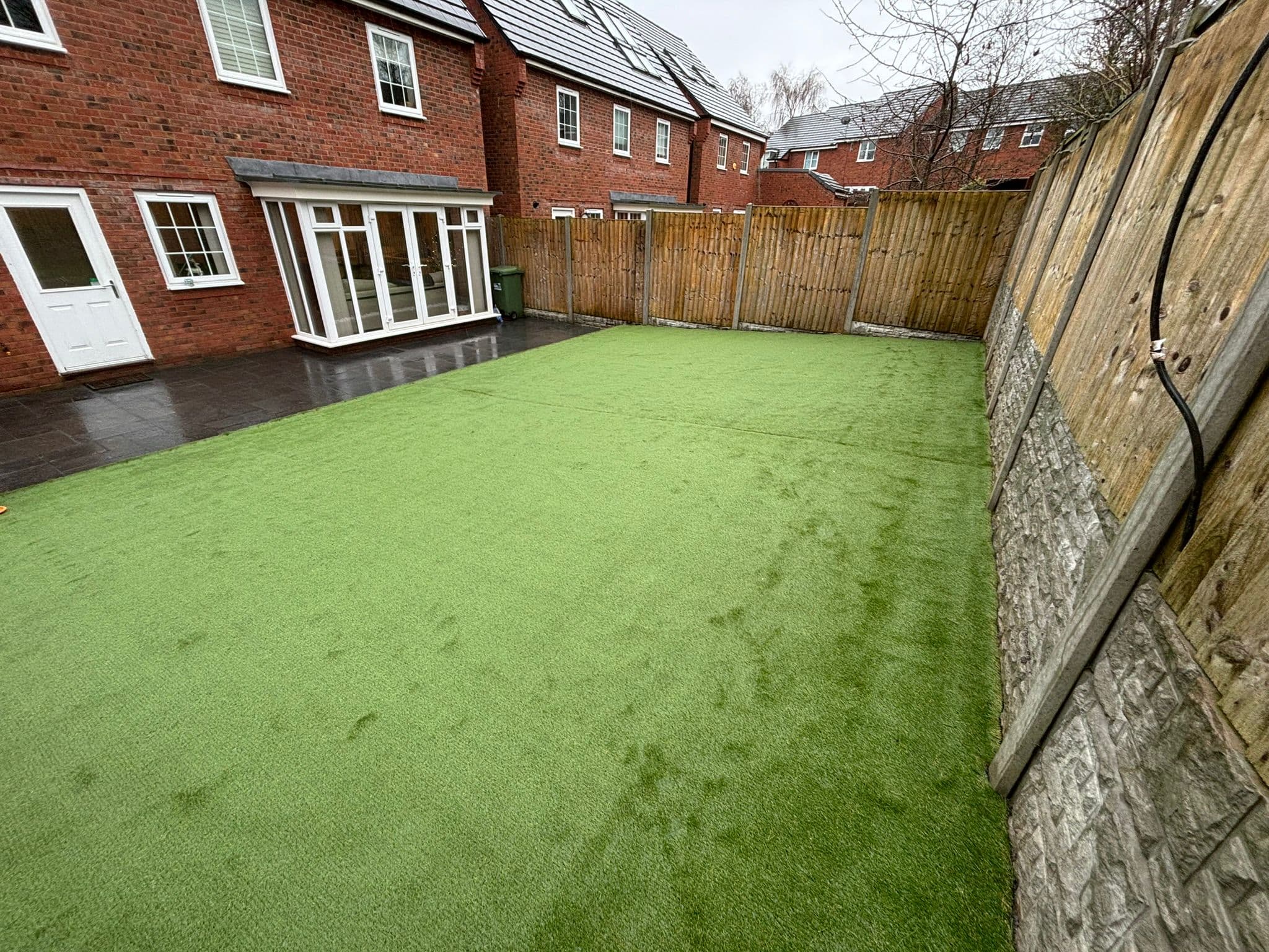 Artificial Grass & Slate Patio - Photo 20